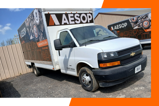 Aesop Auto Parts delivery truck bringing used auto parts across Atlanta Metro